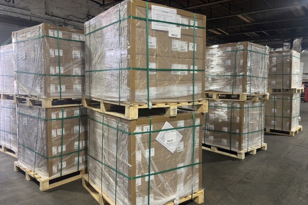 Packaged food pallets wrapped and staged for truckload transportation